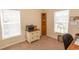 Home office with built-in shelving, and two windows at 5810 Longwood Dr. # 14-304, Murrells Inlet, SC 29576