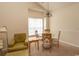 Living room features a comfy couch and access to a balcony at 5810 Longwood Dr. # 14-304, Murrells Inlet, SC 29576