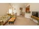 Open concept living area with seating and a view into the kitchen at 5810 Longwood Dr. # 14-304, Murrells Inlet, SC 29576