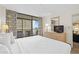 Bright bedroom with a king-size bed and ocean view at 5308 N Ocean Blvd. # 715, Myrtle Beach, SC 29577