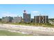 Oceanfront building in a coastal resort area, with beach and other buildings visible at 5308 N Ocean Blvd. # 715, Myrtle Beach, SC 29577