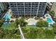 Aerial view showcasing pools, landscaping, and building at 5308 N Ocean Blvd. # 715, Myrtle Beach, SC 29577