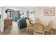 Bright dining area with glass-top table and wicker chairs at 5308 N Ocean Blvd. # 715, Myrtle Beach, SC 29577