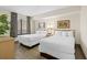 Bedroom with two double beds and access to a balcony at 5308 N Ocean Blvd. # 715, Myrtle Beach, SC 29577
