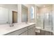 Bathroom with double vanity and glass shower at 580 Duvall St., Longs, SC 29568