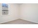 Empty bedroom with neutral walls and carpet at 580 Duvall St., Longs, SC 29568