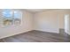 Bright bedroom with large window and gray vinyl flooring at 580 Duvall St., Longs, SC 29568