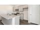 Modern kitchen with gray cabinets and granite countertops at 580 Duvall St., Longs, SC 29568