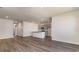 Open concept living room with kitchen and gray flooring at 580 Duvall St., Longs, SC 29568