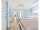 Bright bedroom with two beds, light blue walls, and wood-look floors at 210 75Th Ave. N # 4045, Myrtle Beach, SC 29572