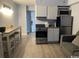 Efficient kitchen features modern appliances and breakfast bar at 1207 S Ocean Blvd. # 20504, Myrtle Beach, SC 29577