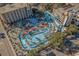 Aerial view of complex with multiple pools and water features at 1207 S Ocean Blvd. # 20504, Myrtle Beach, SC 29577