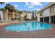 Relaxing kidney-shaped outdoor pool perfect for lounging at 1207 S Ocean Blvd. # 20504, Myrtle Beach, SC 29577