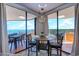 Small dining area with a table and chairs, and ocean view at 9650 Shore Dr. # 902, Myrtle Beach, SC 29572