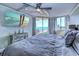 Ocean view bedroom with king-size bed and large TV at 9650 Shore Dr. # 902, Myrtle Beach, SC 29572