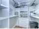 Bright walk-in closet with shelves and drawers at 9650 Shore Dr. # 902, Myrtle Beach, SC 29572