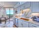 Modern kitchen with granite countertops and stainless steel appliances at 9650 Shore Dr. # 902, Myrtle Beach, SC 29572