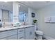 Bathroom with double vanity and large mirror at 9650 Shore Dr. # 902, Myrtle Beach, SC 29572