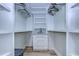 Spacious walk-in closet with ample shelving and hanging space at 9650 Shore Dr. # 902, Myrtle Beach, SC 29572
