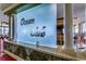 Ocean Club entrance with a stylish frosted glass sign at 9650 Shore Dr. # 902, Myrtle Beach, SC 29572