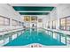 Large indoor pool with a view of the fitness center at 2500 N Ocean Blvd. # 605, Myrtle Beach, SC 29577