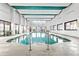 Indoor pool with seating area and high ceilings at 2500 N Ocean Blvd. # 605, Myrtle Beach, SC 29577