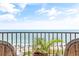 Ocean view from balcony with wicker chairs at 2500 N Ocean Blvd. # 605, Myrtle Beach, SC 29577