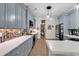 Modern kitchen boasting stainless steel appliances and a farmhouse sink at 249 Venice Way # 3-201, Myrtle Beach, SC 29577