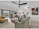 Spacious living room with comfy sofas, large windows, and tasteful decor at 249 Venice Way # 3-201, Myrtle Beach, SC 29577