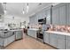 Modern kitchen with stainless steel appliances and gray cabinets at 249 Venice Way # 3-201, Myrtle Beach, SC 29577