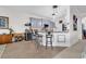 Modern kitchen with gray cabinets, quartz countertops, and a breakfast bar at 249 Venice Way # 3-201, Myrtle Beach, SC 29577