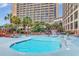 Large resort pool with plenty of lounge chairs at 4800 S Ocean Blvd. # 319, North Myrtle Beach, SC 29582