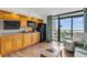 Condo kitchen with wood cabinets and ocean view at 4800 S Ocean Blvd. # 319, North Myrtle Beach, SC 29582