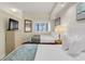 Two twin beds, ocean view, and wood floors in a condo bedroom at 4800 S Ocean Blvd. # 319, North Myrtle Beach, SC 29582