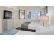 Two twin beds, ocean view, and wood floors in a condo bedroom at 4800 S Ocean Blvd. # 319, North Myrtle Beach, SC 29582