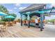 Relaxing beach bar with seating and umbrellas at 4800 S Ocean Blvd. # 319, North Myrtle Beach, SC 29582