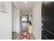 Bright entryway with wood floors and red rug at 805 Woodland Farms Circle, Aynor, SC 29511