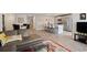 Open living space showcasing the kitchen and dining area at 805 Woodland Farms Circle, Aynor, SC 29511