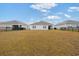 Spacious backyard with grassy lawn and privacy fence at 805 Woodland Farms Circle, Aynor, SC 29511