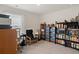 Home office features built-in shelving and comfortable seating at 805 Woodland Farms Circle, Aynor, SC 29511
