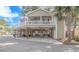 Elevated home with a large deck and parking underneath at 6001 - 7026 S Kings Hwy., Myrtle Beach, SC 29575
