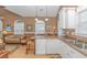 Modern kitchen with white cabinets and breakfast bar at 6001 - 7026 S Kings Hwy., Myrtle Beach, SC 29575