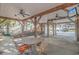 Relaxing covered patio with seating area, hammock, and ceiling fans at 6001 - 7026 S Kings Hwy., Myrtle Beach, SC 29575