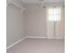 Empty bedroom with neutral walls, carpet, and sheer curtains at 1517 Schooner Ct., Garden City Beach, SC 29576