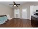 Living room with dark hardwood floors and ceiling fan at 1517 Schooner Ct., Garden City Beach, SC 29576