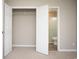 Bedroom with closet and access to a full bathroom at 1517 Schooner Ct., Garden City Beach, SC 29576