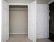 Double-door closet with wire shelving and neutral walls at 1517 Schooner Ct., Garden City Beach, SC 29576