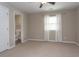 Spacious bedroom with carpet flooring and an ensuite bathroom at 1517 Schooner Ct., Garden City Beach, SC 29576