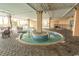 Relaxing pool area with a unique lazy river feature and plenty of lounge chairs at 1321 S Ocean Blvd. # 905, North Myrtle Beach, SC 29582