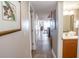 Hallway with tiled floor leading to living areas and bathroom at 1321 S Ocean Blvd. # 905, North Myrtle Beach, SC 29582